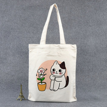 Chillaao cat with flowerpot tote bag