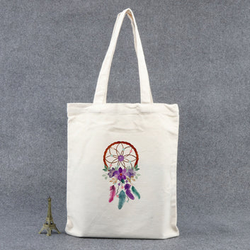 Chillaao dreamcatcher with purple flower  tote bag