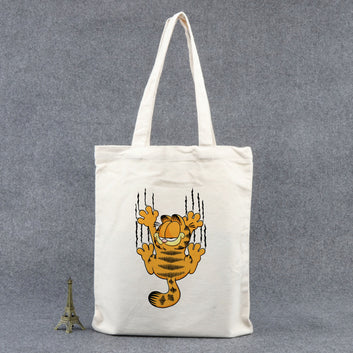 Chillaao scratching cat tote bag